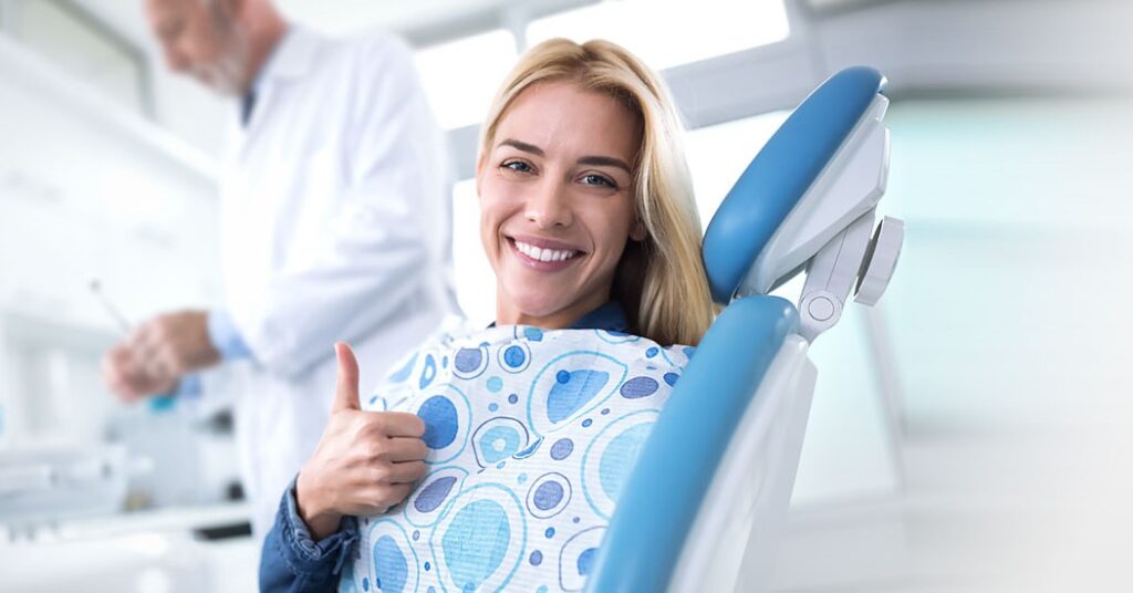 woman smiling at the dentist