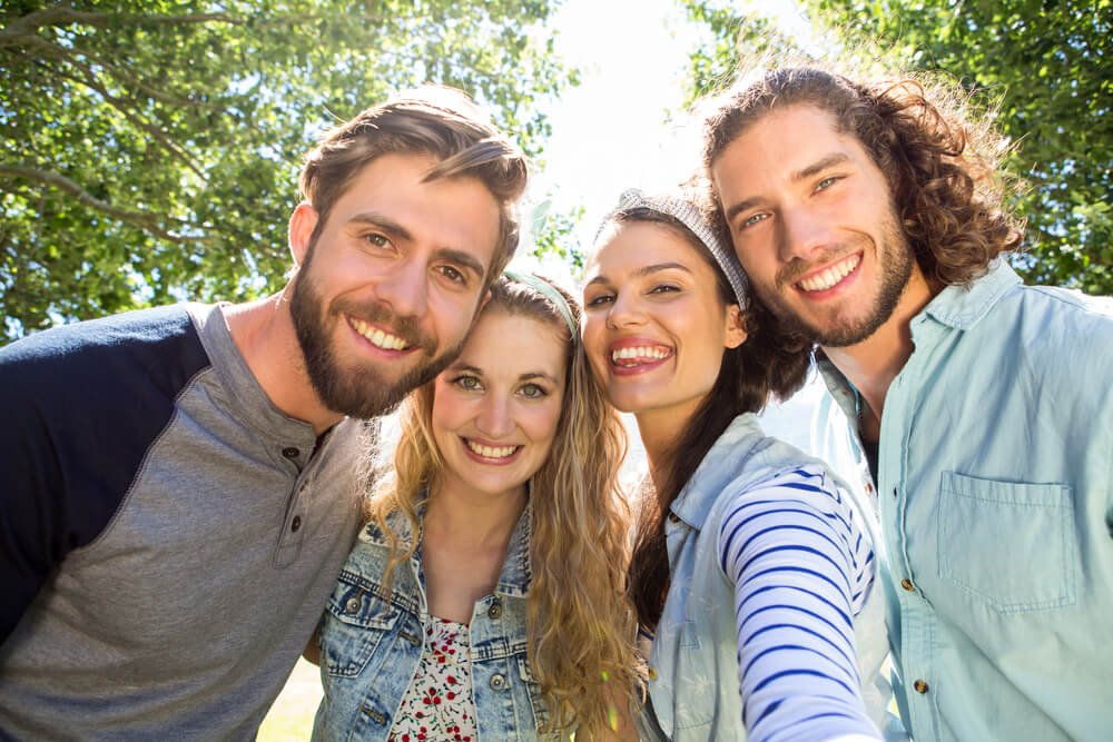 friends smiling for a selfie